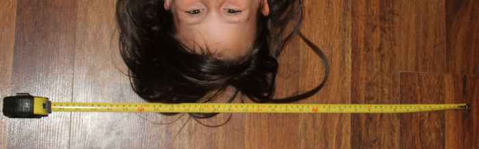 Comparing the length of an eye of the Statue of Liberty with the length of an eye of a student