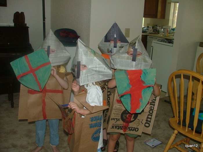 The kids created armor out of cardboard and newspaper.