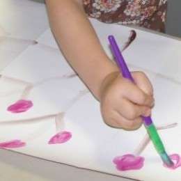 Creating a Japanese Screen with a Sumi-e Style Painting of Cherry Blossoms during the lesson on Japan 