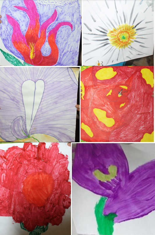Some of the Georgia O'Keeffe inspired flower paintings from this activity