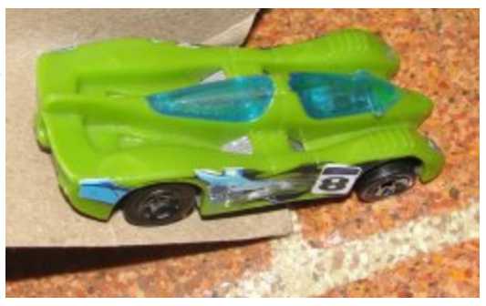 Cars racing down ramps