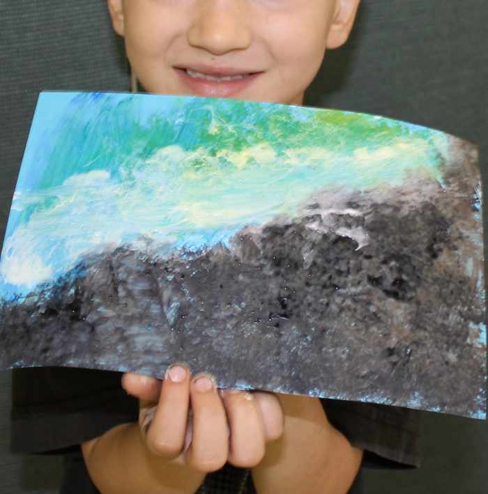 Winslow Homer-inspired textured seascape by a 5 year old