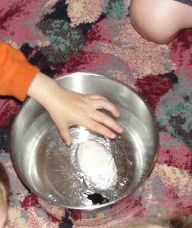 Pumice floating in water while obsidian sinks