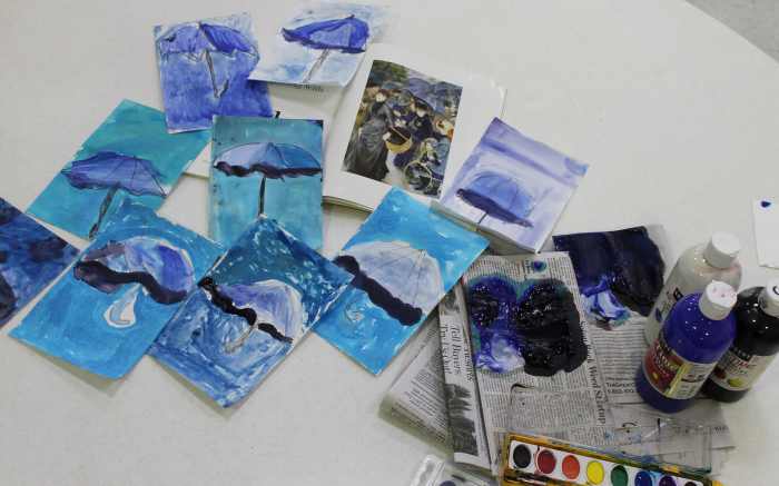 Tints and shades art activity inspired by Renoir's Umbrellas.