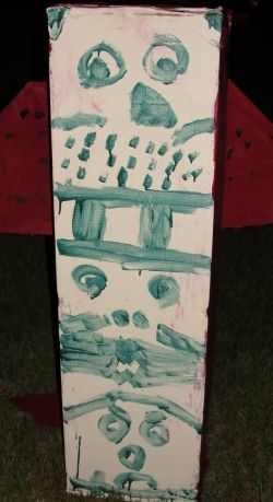 Totem pole made out of boxes and painted by the children