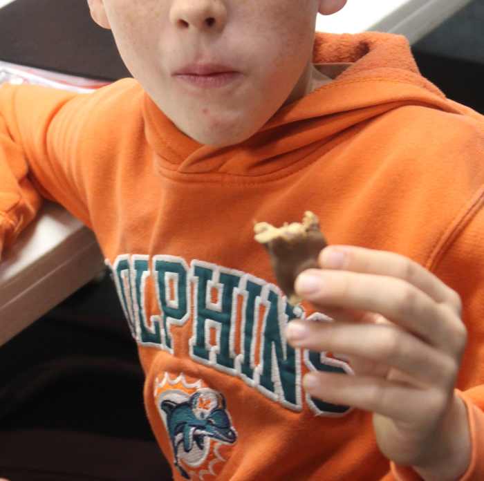 Enjoying a Baby Ruth candy bar afterward 