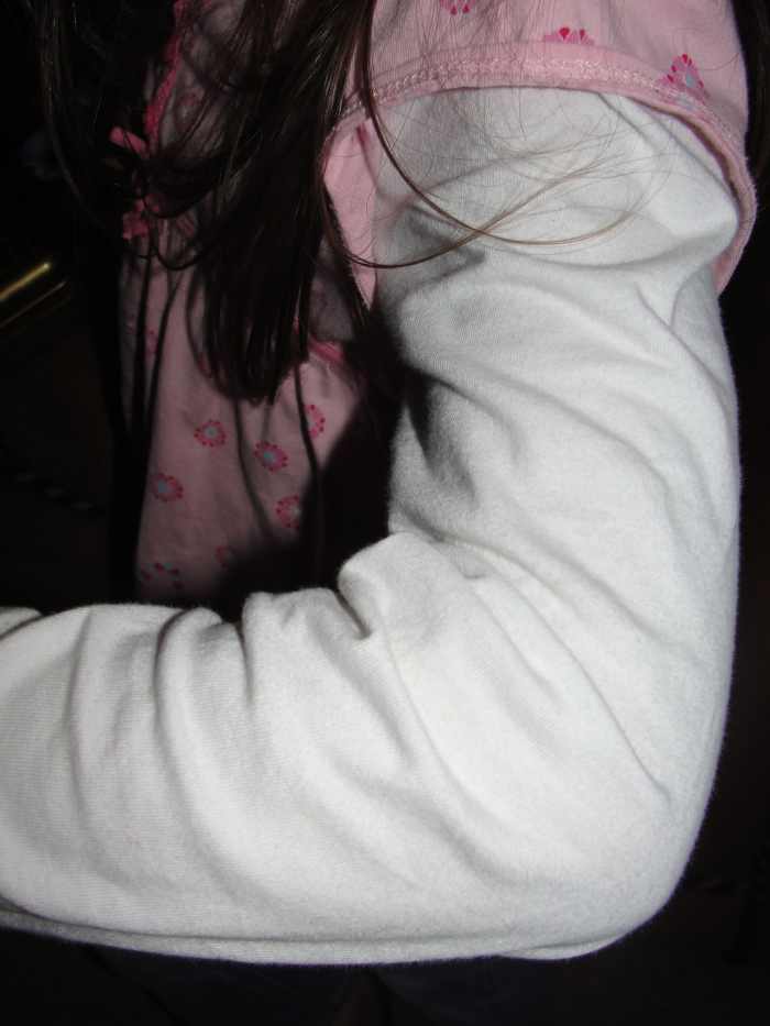 Moving the elbow, a hinge joint, during "Name That Joint" 