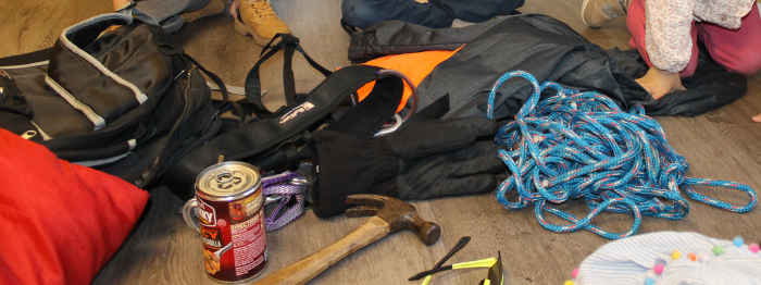 Mainframe backpack, sleeping bag, rope, climbing harness with carabiners, rope, jacket, gloves, hammer (as close to an ice axe as I had), & sun glasses (as close to snow goggles as I had)