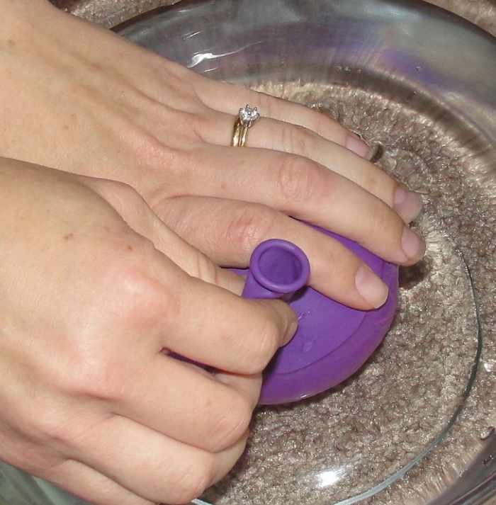 Using a balloon and water to demonstrate how fish bladders work 