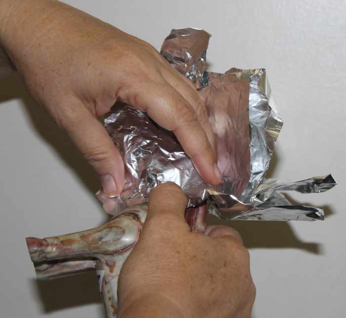"Gilding" a figurine with aluminum foil