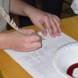 Singing the Declaration of Independence using a quill pen and homemade ink from Lesson 3: Lexington and Concord, Thomas Jefferson, and Declaration of Independence Lesson