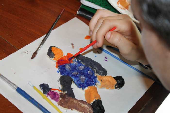 Painting a "terracotta" soldier made from salt dough