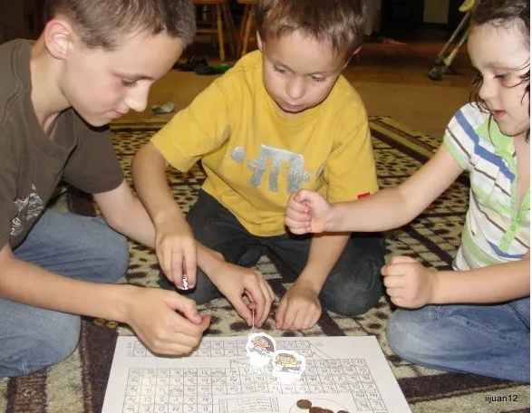 Playing an Atomic Number "board game" was one of the activities we did this week related to Atomic Numbers during our Science Morning Basket & Activities time.