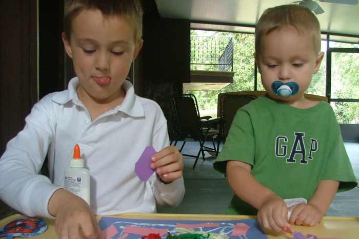 Older children can help entertain or teach younger siblings.