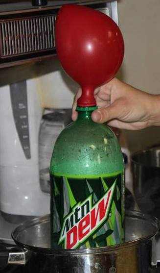 Warm air filling a balloon