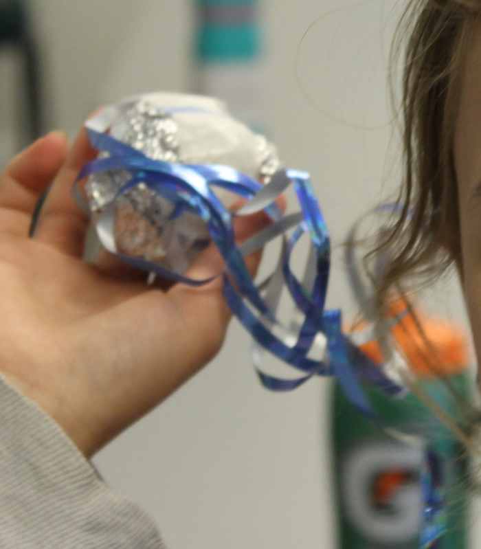 Easiest: Comet on a stick made an aluminum foil ball and curling ribbon on a wooden skewer