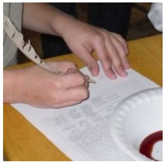 Singing the Declaration of Independence using a quill pen and homemade ink from Lesson 3: Lexington and Concord, Thomas Jefferson, and Declaration of Independence Lesson