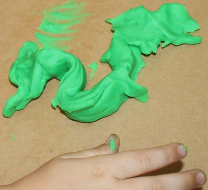 Younger children (preschool & kindergarten age) might prefer to instead form a "jade" sculpture using green play-dough. This is a "jade" dragon created by a preschooler.