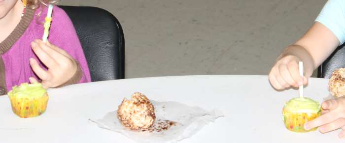 Taking core samples of a cupcake