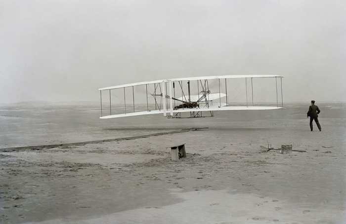The first flight of the Wright Flyer I in 1903