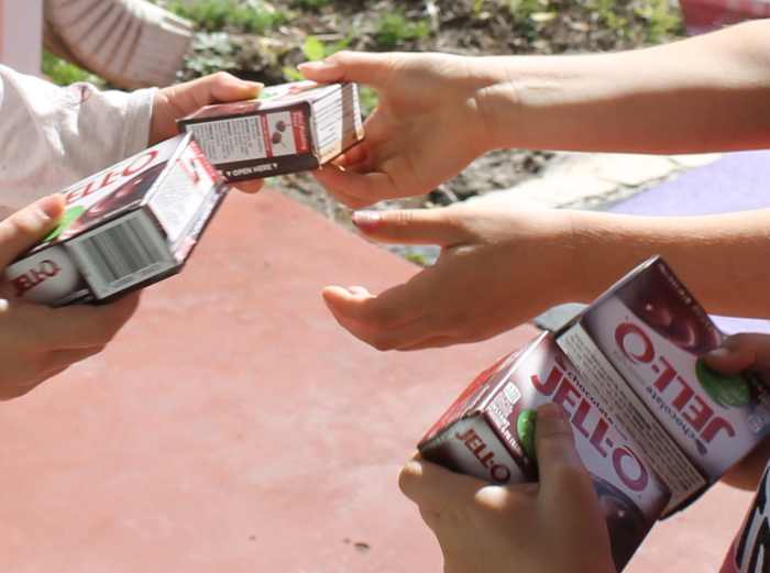 Same volume, different masses (because different items inside) = different densities