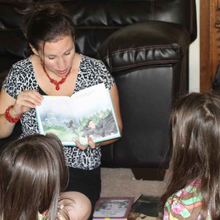 Reading the picture book on Martin Luther by Catherine MacKenzie