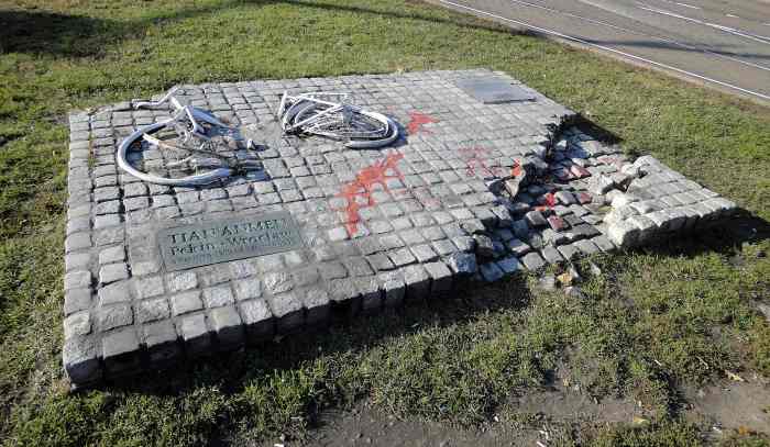 Monument in Memory of Chinese from Tiananmen in Poland, depicting a destroyed bike & tank track as a symbol of the Tiananmen Square protests. Officials destroyed the original monument the day after it was unveiled in 1989, but it was rebuilt in 1999.