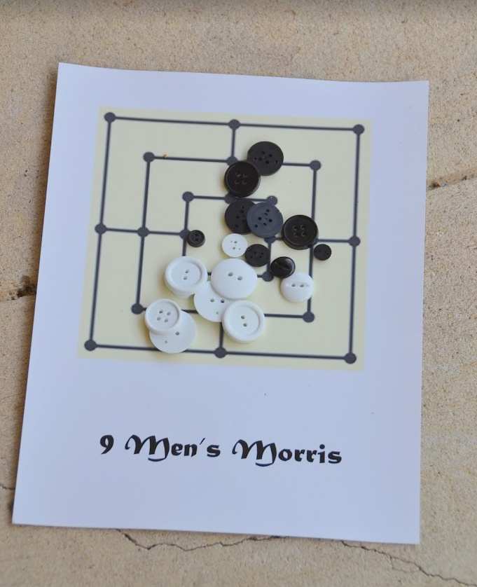 Playing Nine Men's Morris