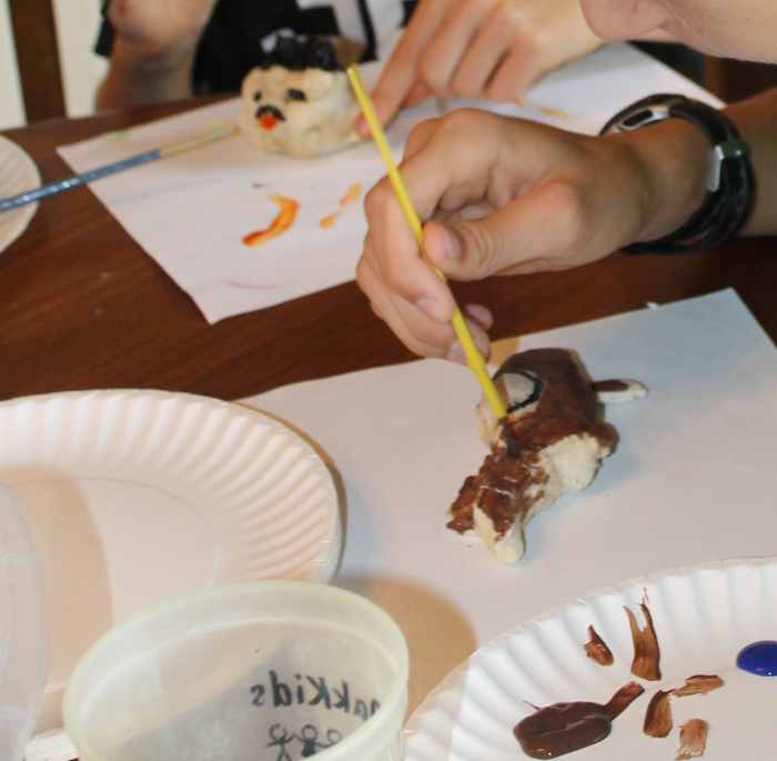Painting a salt dough "terracotta" horse