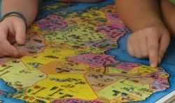 Finding Nigerian on the map - Photo taken by Michelle Harrison, who participates in our class: https://www.facebook.com/MichelleHarrisonPhotography