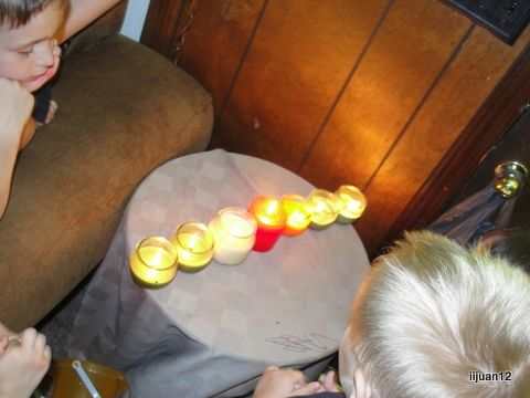 Our "Lamp stand" made from 7 candles on a table