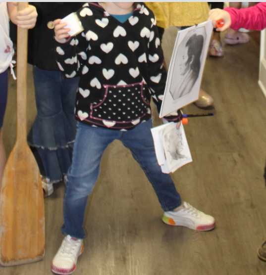 Return trip by boat (using oars) with a photo of the Mandan chief that joined them