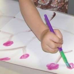 Creating a Japanese Screen with a Sumi-e Style Painting of Cherry Blossoms during the lesson on Japan