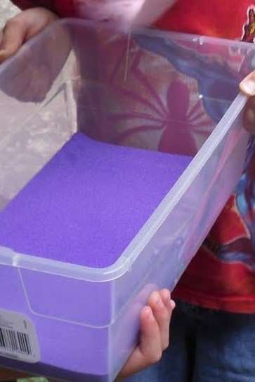 Demonstrating wind erosion (The purple stuff is just playground sand dyed purple. It just happened to be only sand we had at the time. You can just use regular sand.)