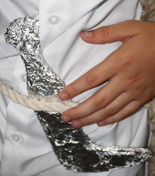  Khanjar made from cutting out the shape on cardboard and covering it aluminum foil