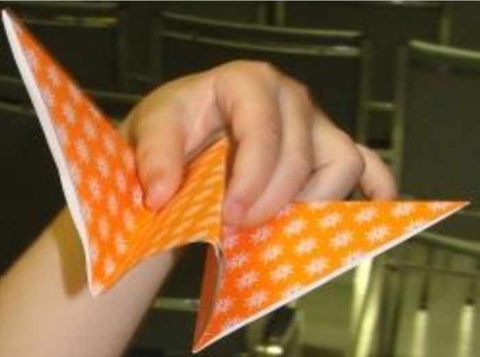 Folding origami butterflies
