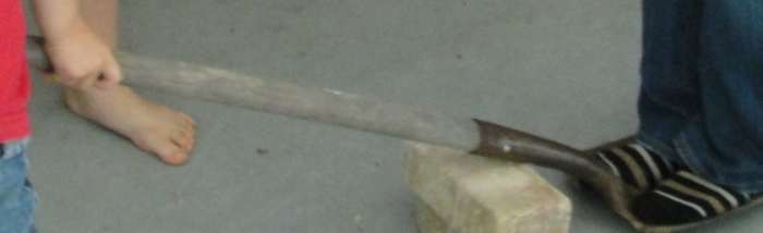 My 3 year old son using a lever to lift me