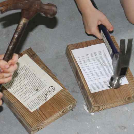 Nailing copies of the 95 Theses to the Wittenberg Door