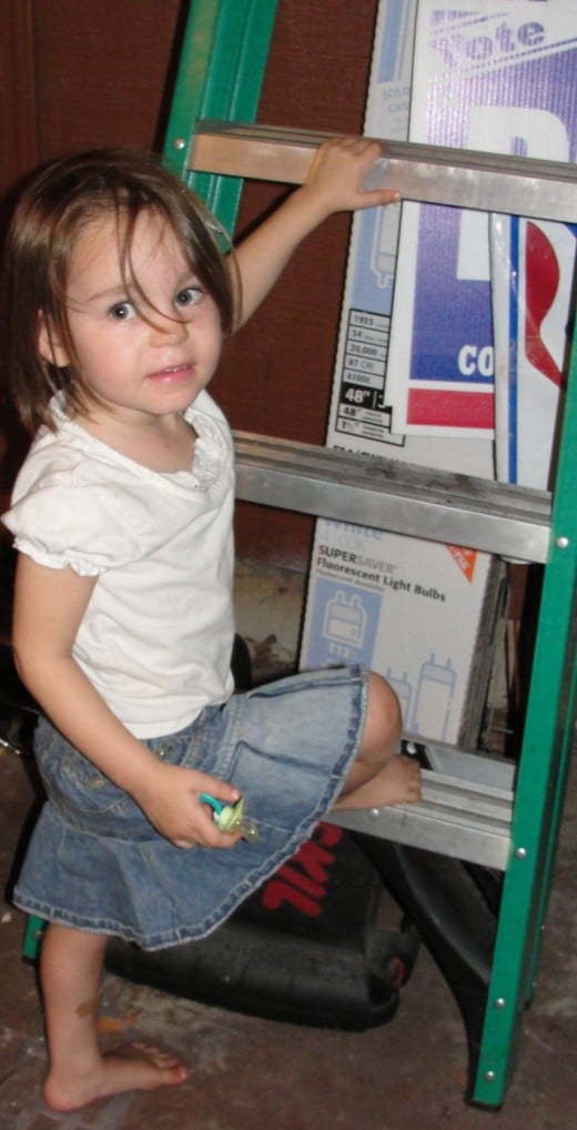 Reacting the lunar landing using a ladder and repeating the line, "That is one small step for a man, one giant leap for mankind."