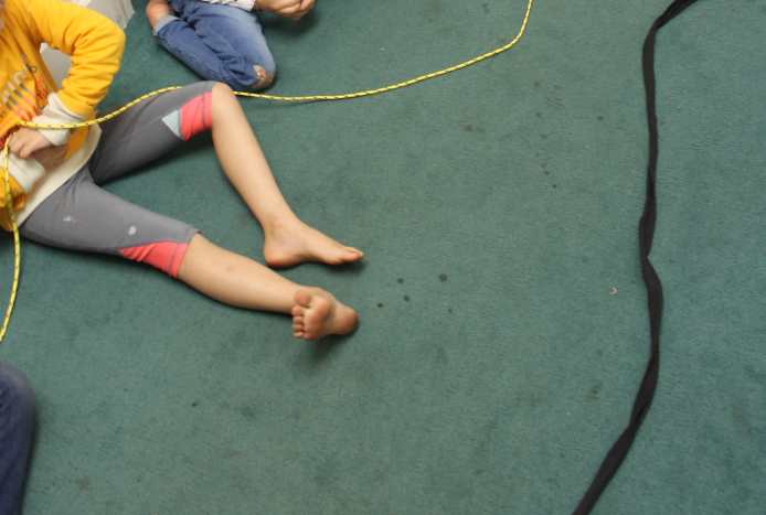 A thicker ribbon/cloth represents the large intestine.