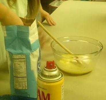 Mixing together the ingredients for Pioneer Persimmon Pudding 