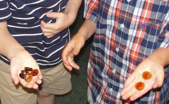 Showing off their "gold" (gold colored glass beads)