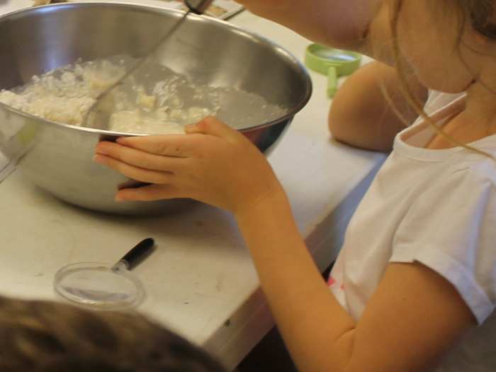 Adding flour and mixing the dough