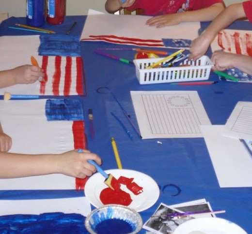 Painting the first flag adopted by the Continental Congress