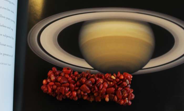 Saturn's rings aren't solid but are made of bits of rock and ice just like this bracelet. 