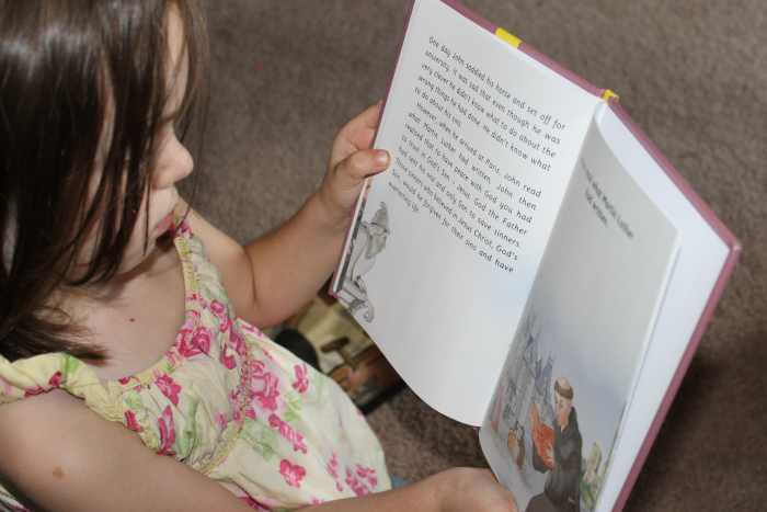 Reading the picture book on John Calvin